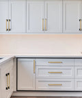 Brushed Brass Square Cabinet Handles Set With Stainless Steel Drawer Pulls For Kitchen, Bath And Bedroom Furnishings, 7-1/2 Inch Hole Spacing 192mm, 10 Pack installed in modern kitchen cabinetry.