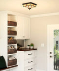 Finley Two Light Valiant Bronze Flush Mount With Multicolored Tiffany Glass Shade in a traditional hallway setting.