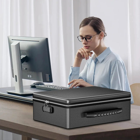Beefy Fireproof Document Box Hard Case With Fireproof Zipper And Lock on desk, shown with woman at computer, black color
