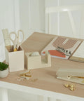 Aesthetic Desk Accessories Set Complete Desktop Organizer For Women With Gold Finish Pen Holder Scissors Stapler Tape Dispenser And More To Level Up Your Home Office Decor And Boost Productivity on a wooden desk