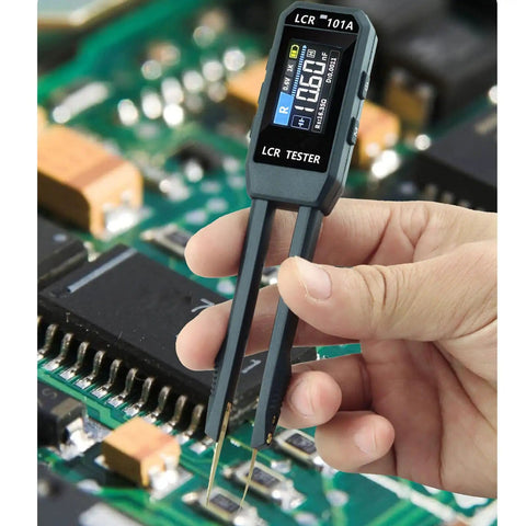 Digital Tweezers Tester And SMD Component Analyzer Multimeter for circuit board repair in use, showing measurement display