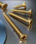 High Strength Zinc Plated Flat Head Wood Screws Rock Solid Self Tapping Hardware Set on metal surface with yellow zinc finish.