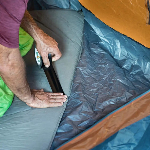 Applying Max Strength Duct Tape Heavy Duty All Weather Waterproof Bond One Roll 1.88 Inch By 35 Yards Black to tent seam