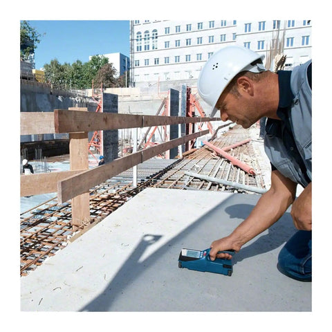 Tough As Nails Stud Finder Wall Scanner With Dead On Digital Display used for scanning concrete on a construction site.