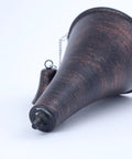 Close-up of Oahu Tiki Style Outdoor Torches Set of 4 53 Inch Tall, showing brushed bronze torch head with snuffer and wick.