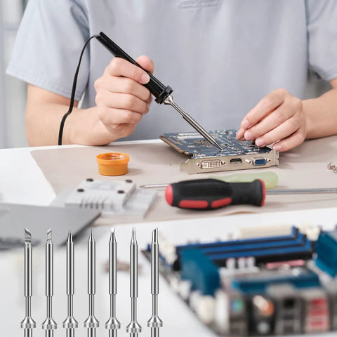 Person using a soldering iron with 7 Types TS100 Soldering Iron Tips Replacement Kit for Mini Digital Soldering Irons displayed below.