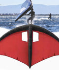 Red Inflatable Windsurf Wing For Windsurfing And Wing Foil Surfing, Handheld Water Wing With Clear View Window and users surfing.