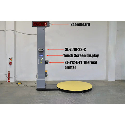 Heavy Duty Industrial Pre Stretch Wrapping Machine With Built In Scale And Thermal Label Printer No Sweat Operation Killer Five Thousand Pound Capacity Straight Shooter Wrap System with yellow turntable and scoreboard.