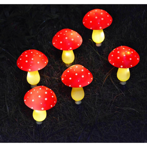 Set of 6 red solar mushroom string lights glowing on grass at night, for Colorful Solar Mushroom String Lights Waterproof Outdoor