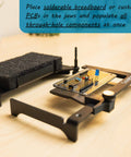 Hands Free Through-Hole Soldering Jig For PCBs And Breadboards CSJ-1 holding a PCB with components on a wooden desk.