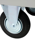 Heavy Duty Platform Truck Flatbed Dolly Cart With Wheels 24x48 Inch Load Carrier Hauls Up To 2000 Lb Capacity Steel Smooth Deck Hand Truck For Moving Trailers And More Gray close-up of wheel and steel frame
