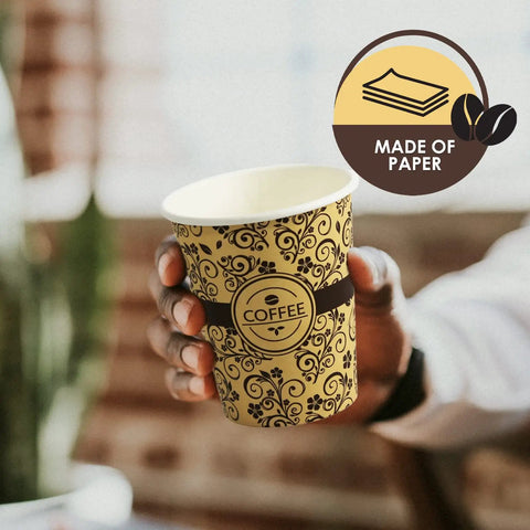 Hand holding 8 Ounce Disposable Paper Coffee Cup For Hot Beverages To Go Leak Resistant And Sturdy Ideal For Espresso Tea And Hot Chocolate