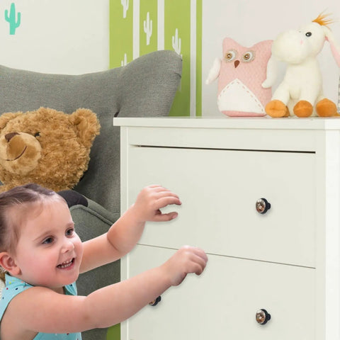 Child reaching for drawer with Set Of 4 1.37 Inch Round Cabinet Knobs Brown Butterfly And Flower Design in bedroom