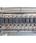Heavy Duty Commercial Tankless Water Heater Pumping Out Endless Hot Water With Smart Adaptive Gas Valve Tech for quick setup.