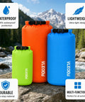 Ultralight Dry Bag Set With Roll Top Closure Waterproof Sacks 3 colorful bags on rocks by stream for hiking camping kayaking