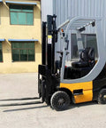 Heavy Duty Electric Forklift Built Like A Tank For Shop Floors And Harbor Jobs Featuring One Piece Forged Fork And Knobby Engineering Tires That Get Work Done Fast, side view.