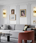 Modern Crystal Wall Sconce Gold Light With Brushed Titanium Finish And Trophy Glass Shade Wall Mount Fixture in living room setting