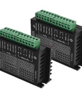 Two TB6600 stepper motor driver controllers with green terminal blocks for CNC motors.