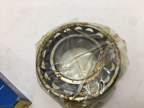 High Performance Grade 22209EB33J30 Spherical Roller Bearing in packaging showing precision machining for industrial use.