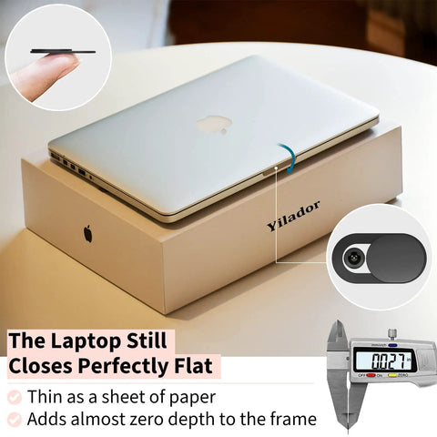 Super Slick Six Pack Webcam Slides With Hella Thin Sliding Frame For Total Security And Private Screen Guarding On Laptops Desktops Macbooks Phones Tablets And Echo Shows Matte Black on a laptop centered above a box.