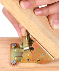 Hands installing Tough As Nails Table Leg Folding Brackets 4 Pack Heavy Duty Self Locking Hinges on wood surface.
