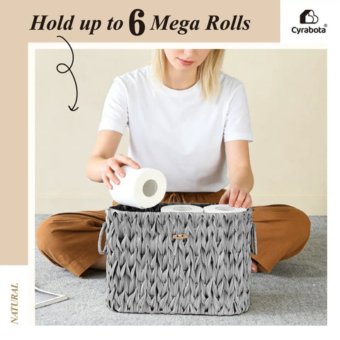 Woman placing toilet paper in Toilet Paper Storage Basket With Lid Made From Water Hyacinth Wicker Holds Up To 6 Mega Rolls
