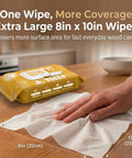 XL Wood Furniture Cleaner Wipes 8X10 Inch 70 Count Cut Through Dust Multi Surface Cleaning Cloths For Kitchen Cabinets Desks And Tables Top Shelf Shine Daily. Hand using wipe on wood surface.