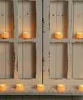 72 Pack Flickering Flameless Tea Lights LED Candles on rustic shelf for Epic Wedding Vibes