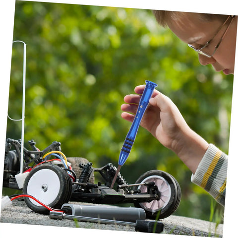 Child using Rc Car Screw Tool Kit With Compact Storage Box, Gasket And Replacement Fasteners on an RC car outdoors for quick repairs.