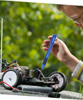Child using RC Car Screw Tool Kit With Compact Case Includes Nuts Bolts And Tools For Various Models Essential Maintenance Set With Durable Iron Fasteners And Metric Screw Assortment For DIY Repairs on RC car