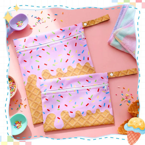 Ice Cream Pink Two Pack Waterproof Wet Dry Bags Set With Zipper Pouches For Baby Diapers Makeup And Swim Gear Large 11.81 By 14.17 Inches Small 10.63 By 7.87 Inches Reusable Travel Pouches displayed on coral background with sprinkles.