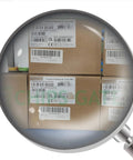 Boxes labeled M3 Network Module For Industrial Automation 1 Piece Plug-and-Play PLC Communication Card visible through magnifying glass