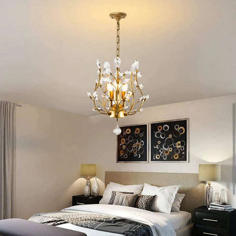 Three Light K9 Crystal Pendant Chandelier In Gold, Modern Glam Ceiling Light For Bedroom, shown with lit bulbs, 13 inch diameter