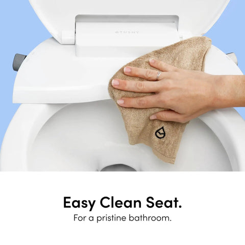 Smooth Non Electric Bidet Toilet Seat Elongated Design With Bamboo Knob Tools Free Setup Fits Small Spaces And Brings Fresh Clean Vibes To Your Bathroom Upgrade Project Today, easy clean surface being wiped.