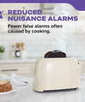 Toaster with burnt toast emitting smoke in kitchen, promoting reduced nuisance alarms by Smart Smoke And Carbon Monoxide Detector.