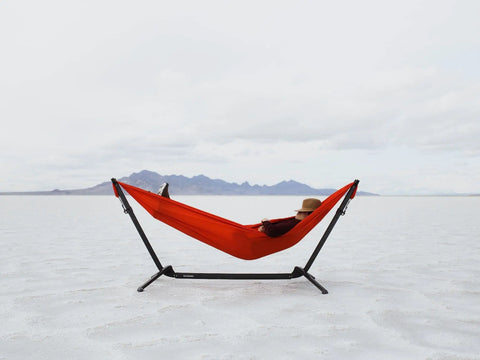 Portable Hammock Stand 15 Lb Lightweight With Quick Setup And Chair Mode Carry Bag And Straps in open terrain