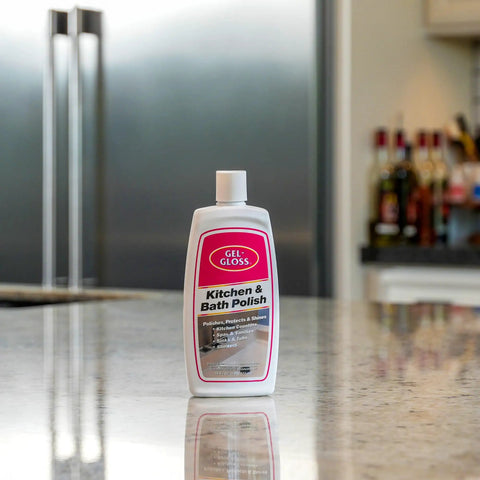 Real Deal Carnauba Wax Kitchen And Bath Polish Removes Scratches Stains Water Spots Protects Fiberglass Marble Acrylic Ceramic Chrome Stainless Steel 16 Oz Jar on a kitchen counter.