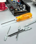 Hex Socket Screwdriver Set 11 Piece Inch Sizes with Ballpoint Tip displayed on a workspace with electronics, close-up of tools.