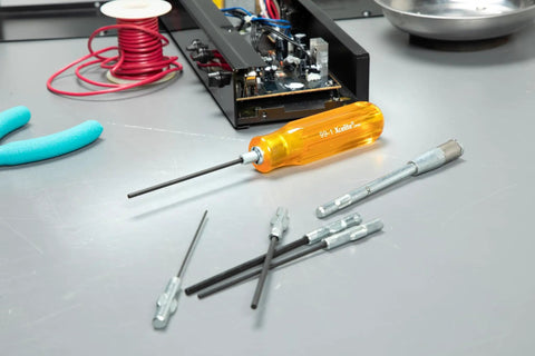 Hex Socket Screwdriver Set 11 Piece Inch Sizes with Ballpoint Tip displayed on a workspace with electronics, close-up of tools.