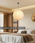 Large Off White Paper Pendant Light 23.6 Inch Japanese Rice Paper Ceiling Lamp With Cord And Canopy in a modern bedroom setting.