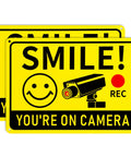 Smile You're On Camera Signs Two Pack Outdoor Video Surveillance Warning Signs 10x7 Rust Free Aluminum UV Printed