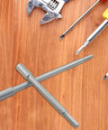 Heavy Duty 2 Pack Seven Plus Ten Inch Forstner Drill Bit Extension With Three Eighth Inch Round Shank, high carbon steel shafts on wooden surface.