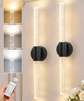 Black Battery Operated Wall Sconces Set of 2 Peel and Stick on, 20.9" with sparkling acrylic tubes and a remote control.