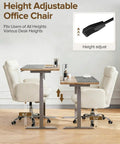 Height adjustable desk setup with heavy duty office chair with footrest and flip up armrests, ergonomic design for comfort.