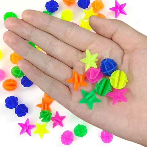Hand holding Colorful Bike Wheel Spoke Beads Set With Round And Star Shapes, 72 Pieces, Easy Clip On Spoke Decorations