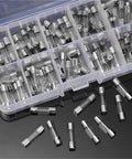 Automotive Fuse Set With 5x20mm Fast Melting Glass Fuses 250V 0.2 To 15 Amp Range in storage box on black surface