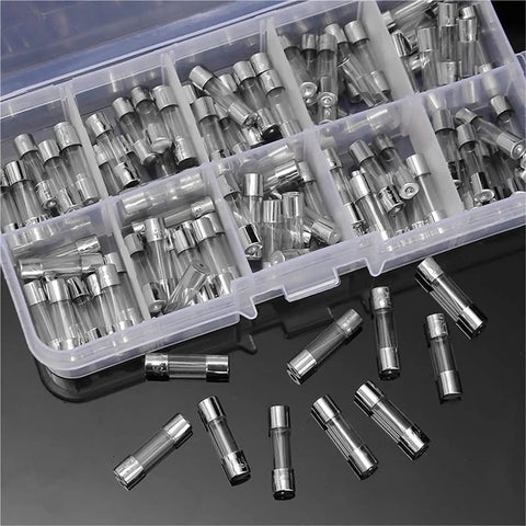 Automotive Fuse Set With 5x20mm Fast Melting Glass Fuses 250V 0.2 To 15 Amp Range in storage box on black surface
