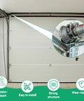 Garage Door Torsion Spring Conversion Kit For 7 Foot High Doors with cable rollers and hardware in garage