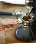 Espresso Portafilter Handle Replacement For Coffee Machines 5.9 Inch Wooden Grip inserted into espresso machine