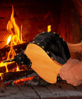 Heavy Duty 19 Inch Fireplace Bellows For Home And Camp being used to blow air into a fire, showcasing wood and zinc nozzle.